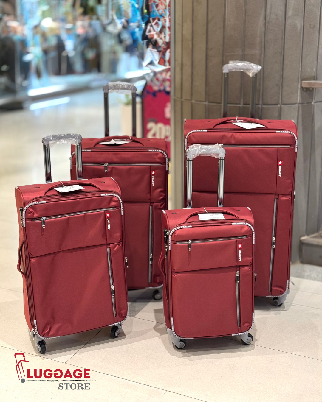Delsey trolley suitcase 4 wheels lightweight travel bag Pakistan